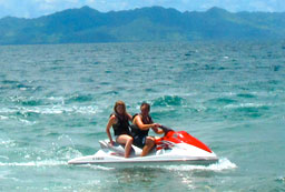 Two riders sharing a jetski on the Jetski-Safari tour